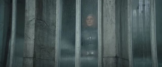 Bo-Katan looks out a rainy window in MANDALORIAN Season 3